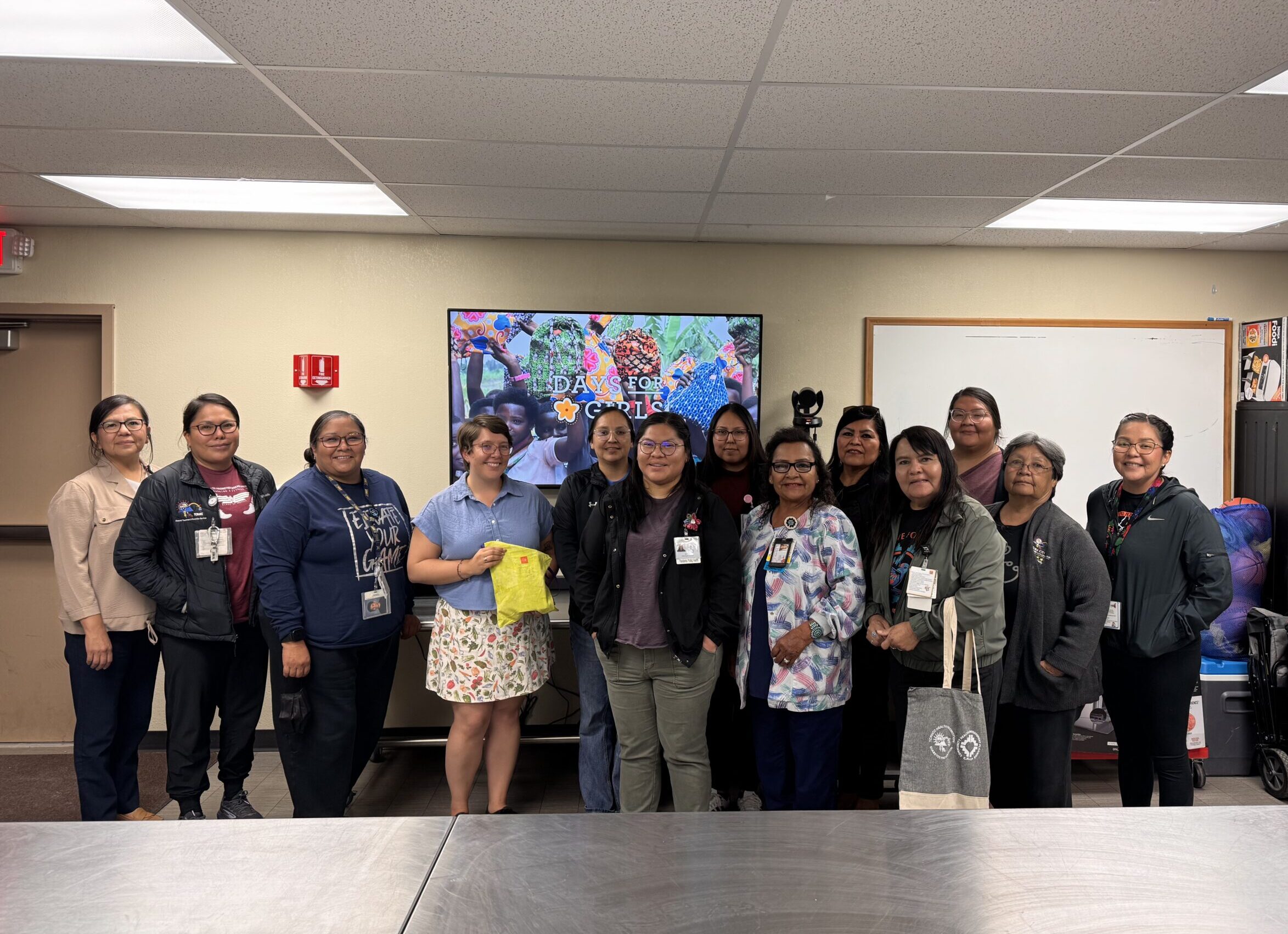 Group of Dina educators with Days for Girls International representatives on the Navajo Nation